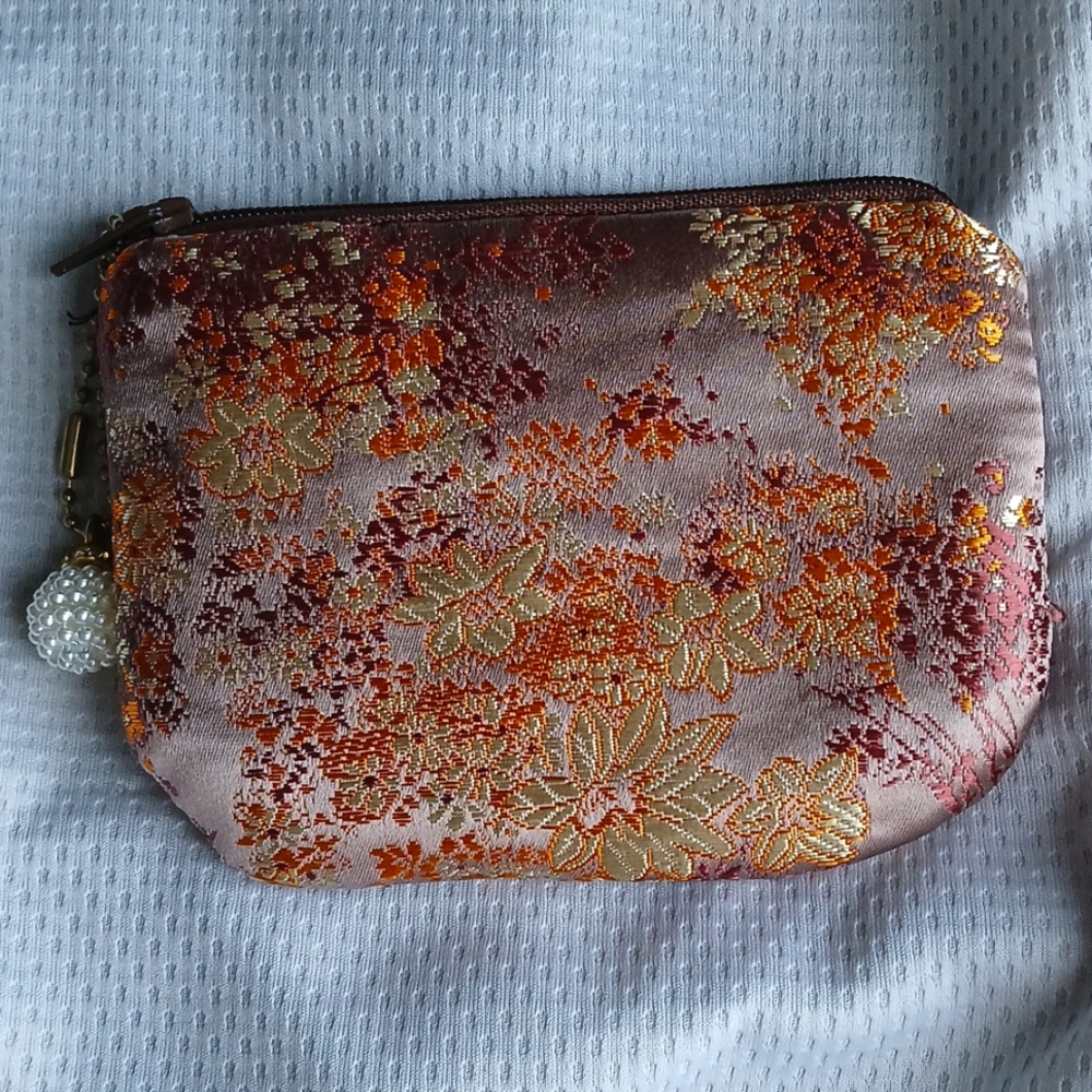 Embroidered silky pouch
